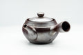 Side view of the purple Banko teapot with its lid