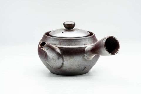 Side view of the purple Banko teapot with its lid