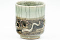 Tezumi — Japanese Teacup - Small Celadon Glazed Obori Soma-yaki Guinomi - 25ml — tipped to show the interior