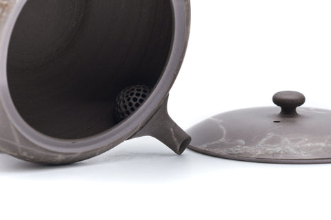 Mogake yakishime unglazed Tokoname kyusu teapot with side handle - lid removed beside the body showing the interior