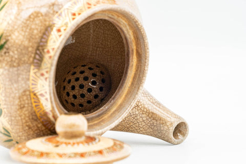 Tezumi — Japanese Kyusu - Weathered Beige Floral Bamboo Decorated Debeso Teapot - 270ml — side profile showing the spout and handle