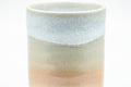 Tezumi — Japanese Teacup - Beige White Peach Tsutsu-gata Hagi-yaki Yunomi - 125ml — tipped to show the interior