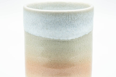 Tezumi — Japanese Teacup - Beige White Peach Tsutsu-gata Hagi-yaki Yunomi - 125ml — tipped to show the interior