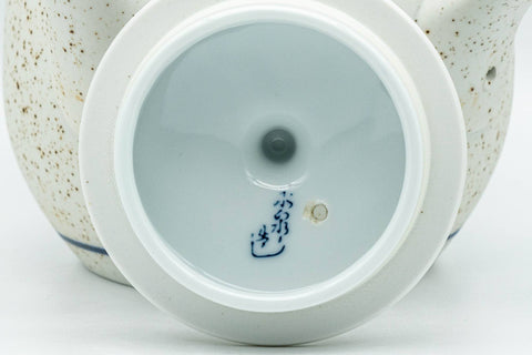 Tezumi — Japanese Tea Set - Blue Floral White Matte Glazed Arita-yaki Debeso Kyusu Teapot and 5 Yunomi Teacups — closeup of the decoration