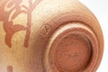 Tezumi — Japanese Teacup - Floral Textured Golden Red and White Inner Glazed Yunomi - 200ml — inverted showing the foot ring