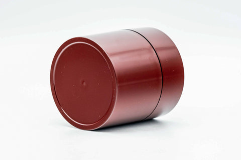 Front view of the canister with the gold inner lid visible at the rim