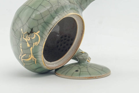 Tezumi — Japanese Kyusu - Golden Horse Green Celadon Glazed Obori Soma-yaki Porcelain Teapot - 200ml — interior view showing the filter