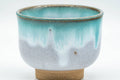 Tezumi — Japanese Teacup - Turquoise Drip-Glazed Agano-yaki Yunomi - 100ml — tipped to show the interior
