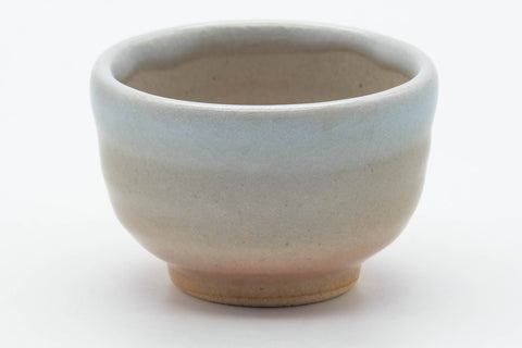 Tezumi — Japanese Teacup - Small Beige White Glazed Hagi-yaki Guinomi - 40ml — tipped to show the interior