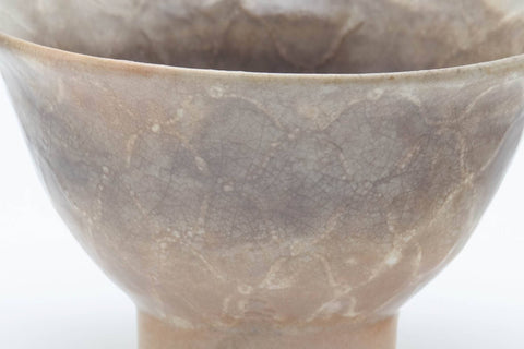 Tezumi — Japanese Teacup - Beige Crazed Glazed Hagi-yaki Yunomi - 80ml — tipped to show the interior