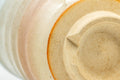 Japanese Teacup - Beige, Peach, and White Hagi-yaki Yunomi - 180ml - top-down view of the underside showing the foot ring
