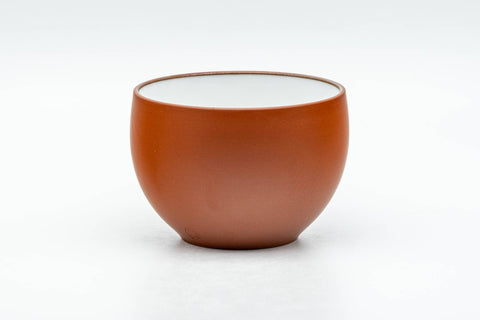 Tezumi — Japanese Teacups - 弘洋 Kouyou - Set of 4 Floral Engraved White Inner-Glazed Tokoname-yaki Yunomi - 110ml — three-quarter view