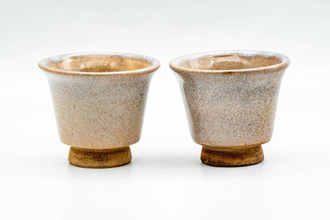 The two Hagi-yaki sake cups viewed from a slightly raised angle