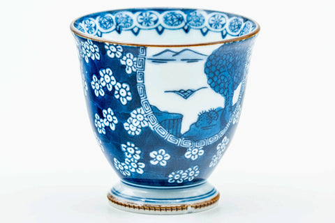 Three-quarter view showing the rim and motifs.