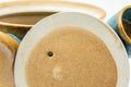 Japanese Tea Set - Agano-yaki Blue Drip-Glazed Do-ake Kyusu Teapot with 2 Yunomi Teacups - closeup of the underside and foot