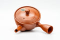Japanese Kyusu - Spiraling Red Shudei Tokoname-yaki Mesh Teapot - 250ml - top-down view of the lid and knob showing the concentric spiral ridges