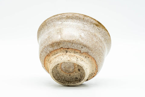 Japanese Teacup - Small Beige Glazed Guinomi - 40ml - tilted view showing the foot and base
