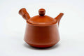 Another angled view of the lidded red shudei kyusu.