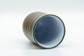Japanese Teacup - Nerikomi Tokoname-yaki Yunomi - 120ml - cup tilted to show the white glazed interior