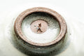 Tezumi — Japanese Matcha Bowl - Milky White Glazed Faceted Chawan - 250ml — inverted showing the foot ring