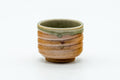 Tezumi — Japanese Teacup - Orange Green Spiraling Shigaraki-yaki Guinomi - 30ml — front view