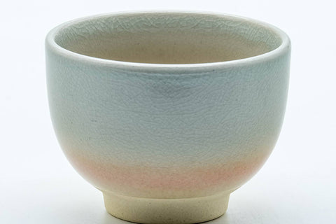 Tezumi — Japanese Teacup - 天鵬山 Tsubaki Kiln - Classic Beige Hagi-yaki Yunomi - 80ml — tipped to show the interior
