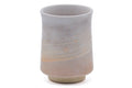 Tezumi — Japanese Teacup - Beige White Weathered Hagi-yaki Yunomi - 160ml — tipped to show the interior