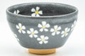 Japanese Matcha Bowl - Small Floral Grey Celadon-Glazed Tenmoku-gata Chawan 200ml - angled front view of the floral design