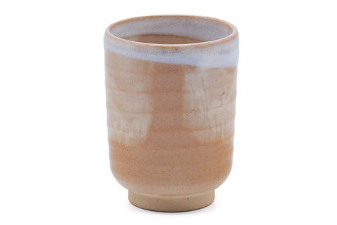 Tezumi — Japanese Teacup - Beige Milky White Hagi-yaki Yunomi - 150ml — tipped to show the interior