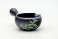 Black Tokoname-yaki kokudei clay yuzamashi water cooler shown from the front, with a side handle, pouring spout, and hand-painted floral decoration.