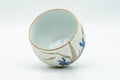 Tezumi — Japanese Teacup - White and Blue Floral Arita-yaki Yunomi - 140ml — three-quarter view