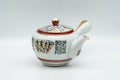 Tezumi — Japanese Tea Set - Geometric Script Kutani-yaki Debeso Kyusu Teapot with Katakuchi Water Cooler and 5 Yunomi Teacups — the teapot in three-quarter view