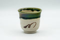 Japanese Teacup - Beige Green Drip-Glazed Geometric Oribe-yaki Yunomi - 70ml - front view showing the green drip-glaze rim and decoration