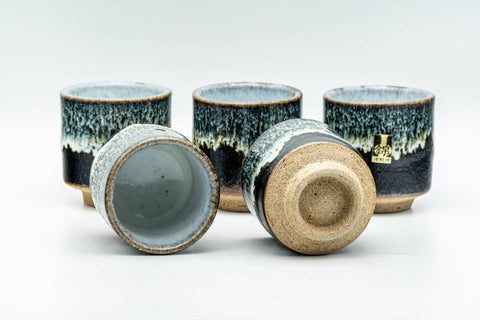 Tezumi — Japanese Teacups - Set of 5 Jet Black Blue Drip-Glazed Yunomi - 80ml — three-quarter view
