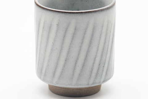 Tezumi — Japanese Teacup - Spiraling White Grey Glazed Yunomi - 130ml — tipped to show the interior
