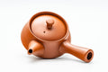 Overhead view of the teapot with the lid and knob in place and the handle extended.