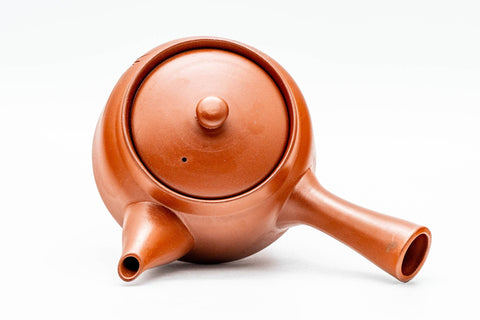 Overhead view of the teapot showing the lid, spout and side handle