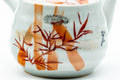 Japanese Kyusu - Red Bamboo Motif Kutani-yaki Porcelain Teapot - 370ml - side view showing the red bamboo decoration on the body