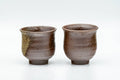 Tezumi — Japanese Teacups - Pair of Ash Green Glazed Guinomi - 55ml — front view from another angle