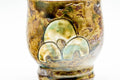Back three-quarter view highlighting the iridescent bubbled glaze detail.