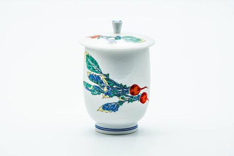 The covered yunomi with its knobbed lid in place, the turnip painting facing forward.