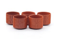 Tezumi — Japanese Tea Set - Bamboo Engraved Tokoname-yaki Kyusu Teapot with 5 Yunomi Teacups — closeup of a single piece