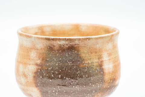 Tezumi — Japanese Teacups - Pair of Beige Brown Gohonte Hagi-yaki Yunomi - 180ml — tipped to show the interior