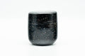 Japanese Natsume - Heavy Speckled Stone Matcha Tea Caddy - 50ml - side view of the closed speckled caddy
