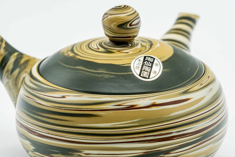 Overhead view of the lid in place, showing the marbled lid and knob.