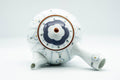 Top-down view of the teapot lid and the blue debeso strainer opening inside the mouth