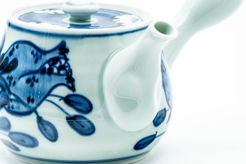 Japanese Kyusu - Blue Floral Arita-yaki Ceramic Filter Teapot - 400ml - three-quarter view showing the spout and blue floral decoration