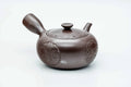 Purple-brown Banko-yaki kyusu, front view with the spout to the left and side handle to the right