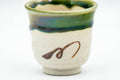Japanese Teacup - Beige Green Drip-Glazed Geometric Oribe-yaki Yunomi - 70ml - front view showing the geometric pattern and green drip glaze