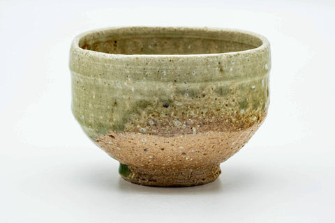 Green-celadon Shigaraki chawan, front view of the earthy bowl
